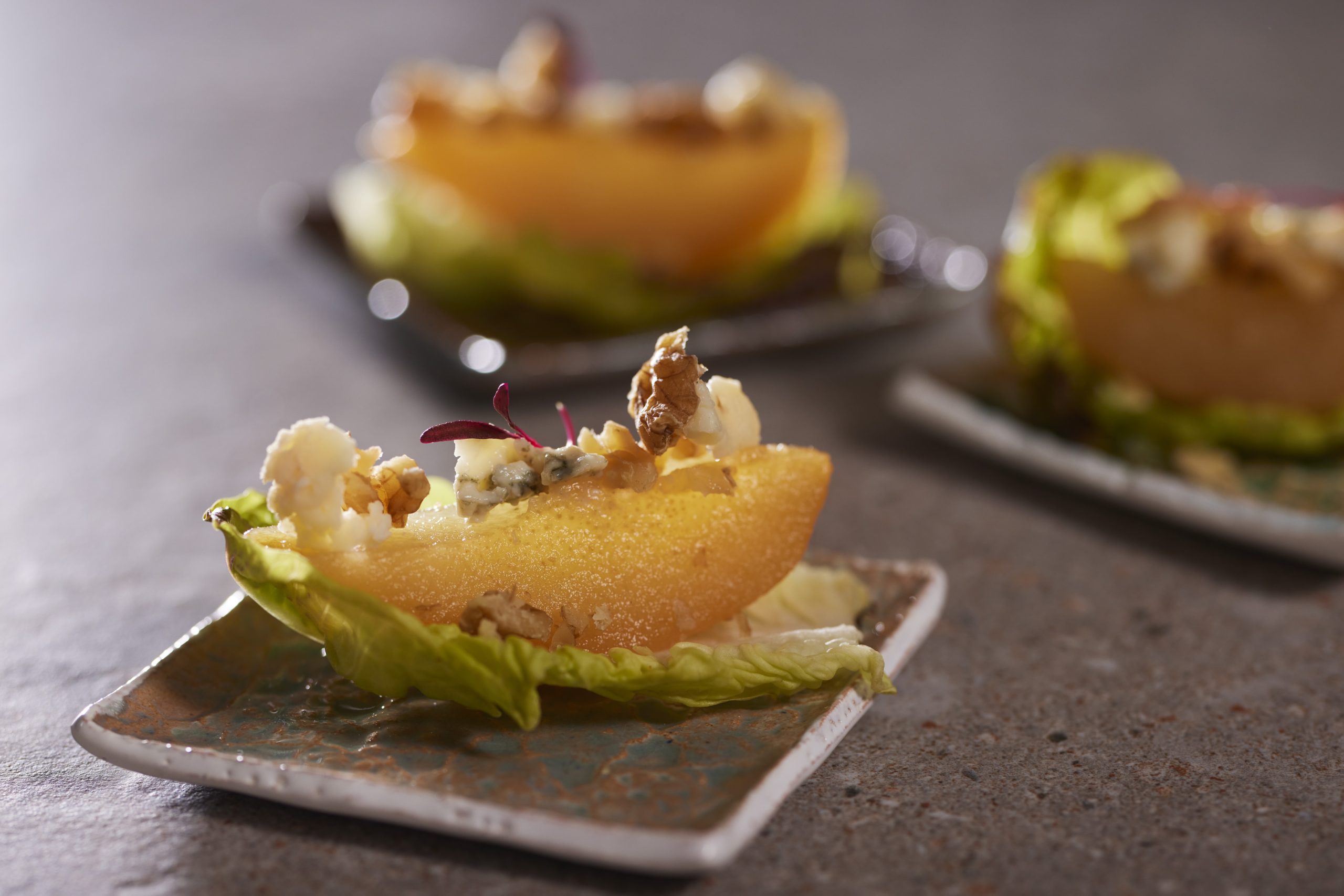 Three canapés on small dishes